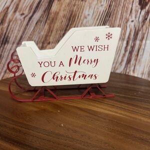 Festive Red and White Holiday Sleigh Decoration